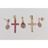 FOUR PIECES OF JEWELLERY, to include a ruby set cross pendant, fitted with a tapered bail,