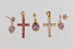 FOUR PIECES OF JEWELLERY, to include a ruby set cross pendant, fitted with a tapered bail,