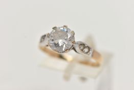 A 9CT GOLD CUBIC ZIRCONIA RING, designed as a central circular colourless cubic zirconia to the