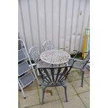 AN ALUMINIUM GARDEN TABLE, and four chairs including two armchairs, a pair of wooden folding