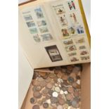 A BOX OF ASSORTED COINS AND STAMPS, assorted coinage and an album of first day covers and loose