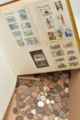 A BOX OF ASSORTED COINS AND STAMPS, assorted coinage and an album of first day covers and loose
