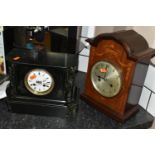 TWO EARLY 20TH CENTURY CLOCKS, comprising an inlaid oak 'Junghans' mantel clock with white Arabic