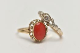 TWO GEM SET RINGS, the first a yellow metal ring set with an oval coral cabochon, openwork