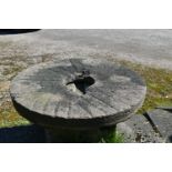 A LARGE AND HEAVY VINTAGE QUIRN STONE diameter 102cm thickness12cm at thickest point Condition crack