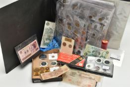 A CARDBOARD BOX CONTAINING A COIN ALBUM AND A SMALL AMOUNT OF BANKNOTES, to include a coin album