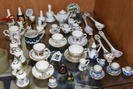 A COLLECTION OF MINIATURE CERAMICS AND OTHER MINIATURES, over fifty pieces to include a Royal