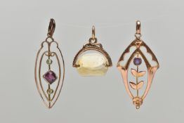THREE PENDANTS, the first a rose metal openwork floral drop pendant set with a small circular cut