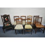 AN EDWARDIAN MAHOGANY NEEDLEWORK CHAIR, along with a three walnut bar back chairs, two elm Welsh