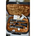 A CASED LA FLEUR CLARINET with a mouthpiece stamped 10 and lower section stamped 199, along with