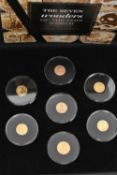 THE SEVEN WONDERS OF THE COIN WORLD' GOLD EDITION COIN SET, seven coins each in a plastic capsule,