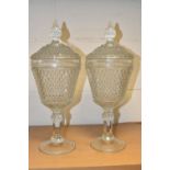 TWO LATE 20TH CENTURY AMERICAN 'INDIANA GLASS' CLEAR PRESSED GLASS JARS AND COVERS OF CHALICE