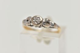 A DIAMOND RING, a single round brilliant cut diamond set within a white metal mount with scrolling