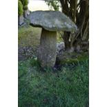 A VINTAGE SANDSTONE STADDLE STONE with square top width 45cm depth 45cm height 80cm Condition some