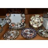 NINE ROYAL CROWN DERBY AND SIMILAR IMARI PLATES, comprising a Royal Crown Derby 1128 side plate
