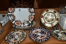 NINE ROYAL CROWN DERBY AND SIMILAR IMARI PLATES, comprising a Royal Crown Derby 1128 side plate