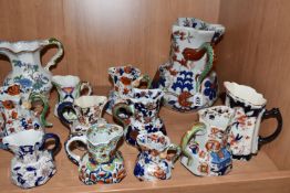 A COLLECTION OF IRONSTONE JUGS, comprising a large pitcher in Basket Japan pattern with a serpent
