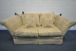 A KNOWLE GOLD UPHOLSTERED SOFA, with scatter cushions, length 196cm x depth 94cm x 76cm