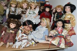 A GROUP OF COLLECTORS DOLLS, sixteen male and female dolls, including pairs of Japanese style and