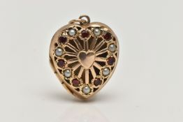 A 9CT GOLD HEART LOCKET PENDANT, openwork heart shape pendant set with alternating garnets and split