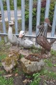 A SELECTION OF GARDEN ORNAMENTS to include two geese ornaments, an iron cockerel ornament along with
