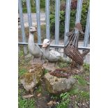 A SELECTION OF GARDEN ORNAMENTS to include two geese ornaments, an iron cockerel ornament along with