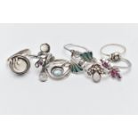 EIGHT WHITE METAL RINGS, various designs some set with semi-precious gemstones such as moonstone,