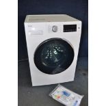 A HAIER HW100B1439N WASHING MACHINE measuring width 60cm x depth 69cm x height 85cm (PAT pass and