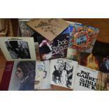A BOX CONTAINING APPROX FIFTY LPs, A SINGLE AND A TAPE BOXSET including 32 by Bob Dylan items of