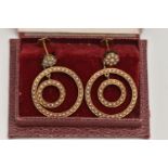 A PAIR OF YELLOW METAL SEED PEARL DROP EARRINGS, each earring designed with two forward facing rings