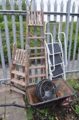 TWO SETS OF WOODEN LADDERS along with a pair of metal steps, wheelbarrow and three plastic hanging