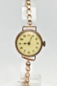 A MID 20TH CENTURY WRISTWATCH, manual wind, round dial, Arabic numerals, in a gold filled case,