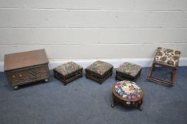 A VICTORIAN WALNUT FOOTSTOOL, on triple cabriole legs, along with three matching Edwardian