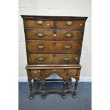 A PART QUEEN ANNE WALNUT CHEST ON STAND, the top section with two short over three long drawers,