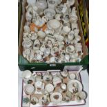 A QUANTITY OF CRESTED WARE, to include an assortment of miniature pots, jars and vases, maker's