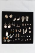 AN ASSORTMENT OF WHITE METAL EARRINGS, twenty four pairs of earrings, to include stud and drop
