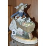 A LLADRO 'A BARROW OF FUN' FIGURE, model no 5460, depicting a girl pushing a wheelbarrow of