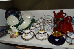 A COLLECTION OF TEAWARE, comprising Poole Pottery Odyssey design teapot, two cups and two saucers, a