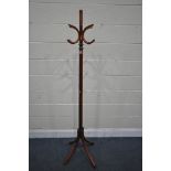 A STAINED BEECH COAT STAND, height 184cm