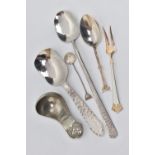 AN ARTS AND CRAFTS PEWTER CADDY SPOON BY JOHN H GREEN AND A FIVE OTHER ITEMS OF FLATWARE, the