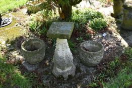 A MODERN COMPOSITE PAIR OF SMALL PLANTERS 30cm in diameter and a pedestal with a square top (3)(