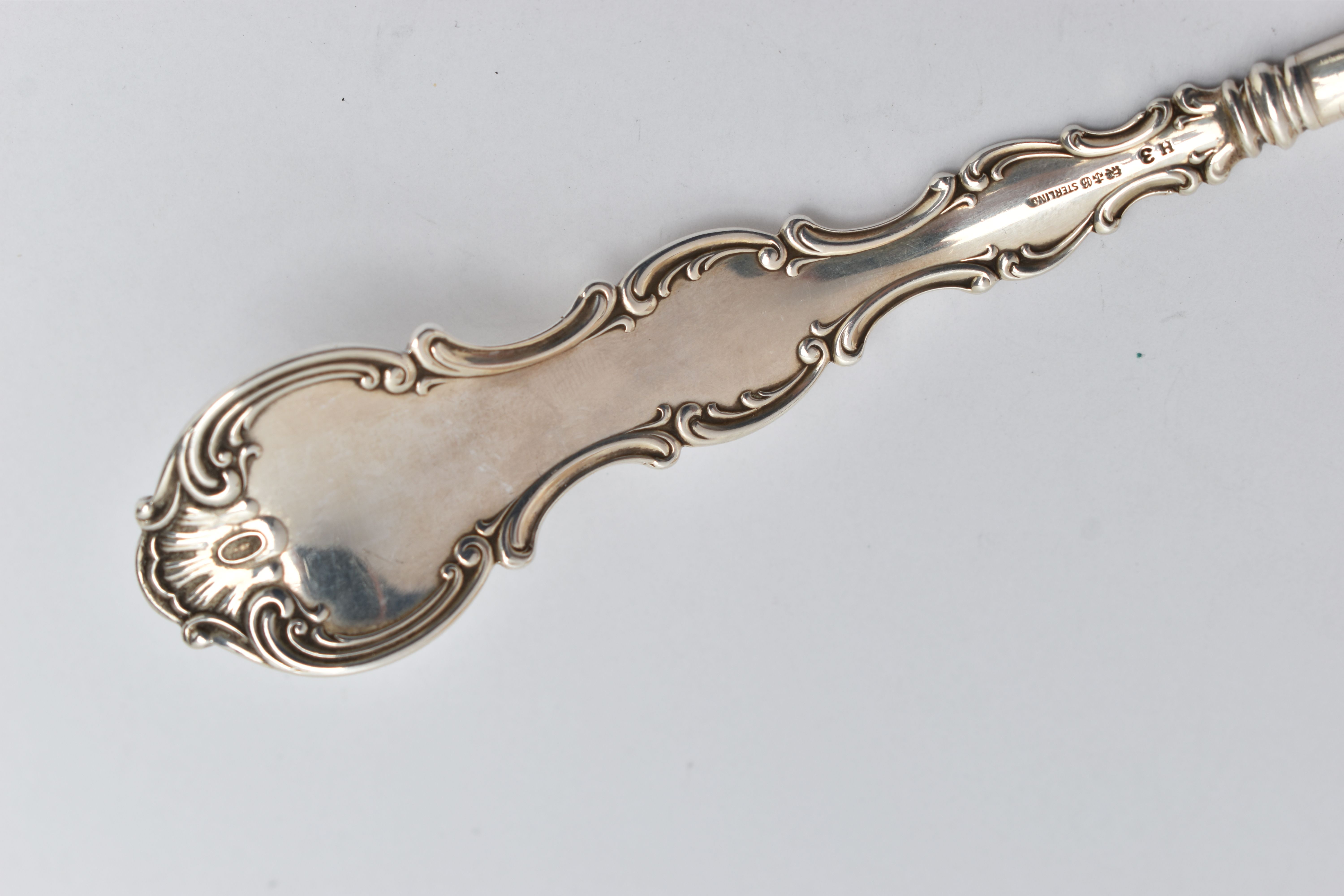 AN AMERICAN STERLING SILVER LADLE, the handle cast with scroll and shell decoration and engraved - Image 7 of 7