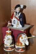 THREE LIMITED EDITION CERAMIC CANDLE SNUFFERS, comprising a pair of Royal Worcester Lion & Unicorn