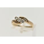 A 9CT GOLD THREE STONE DIAMOND RING, designed with three small round brilliant cut diamonds, each