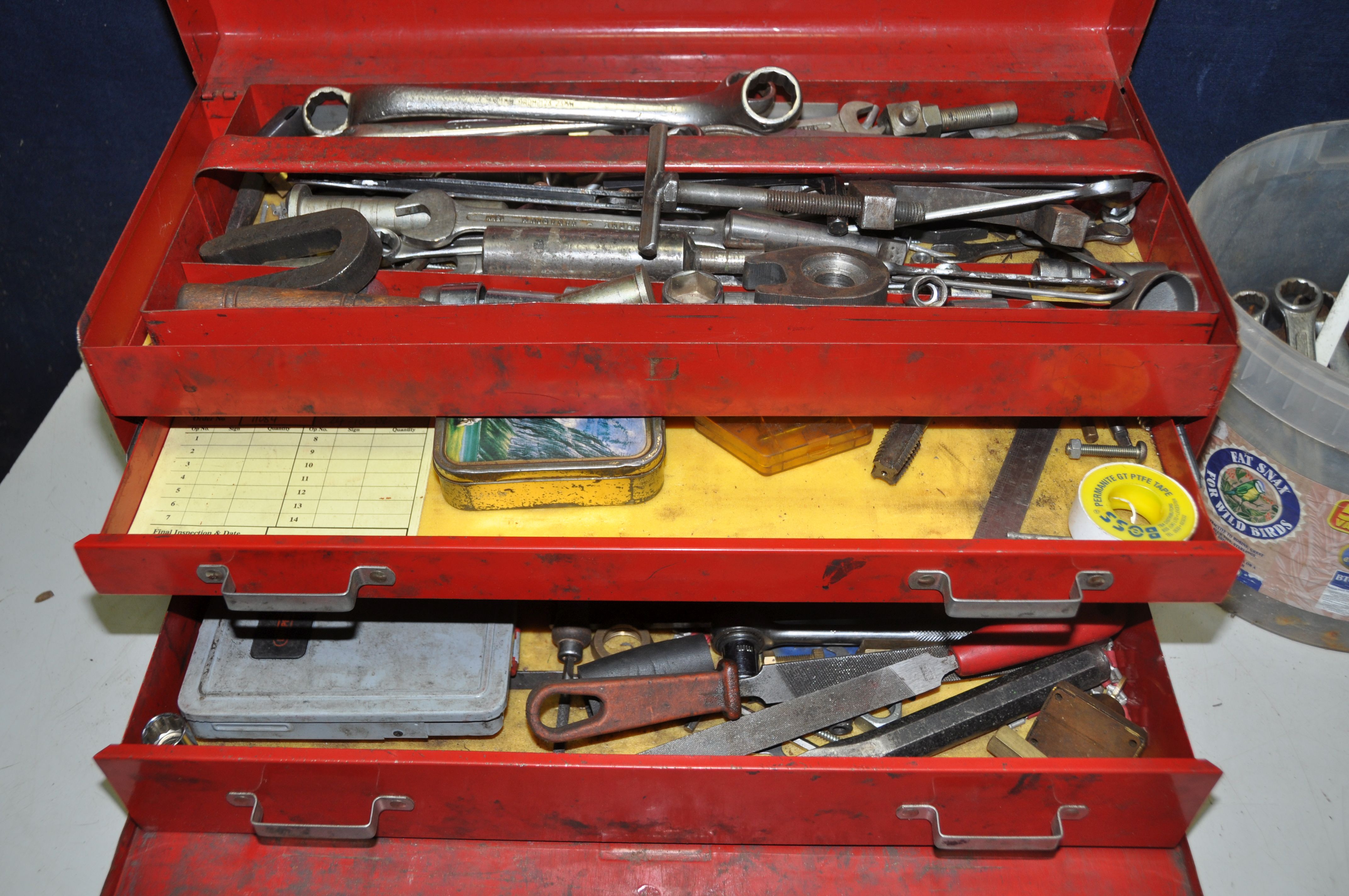 A METAL BEACH TOOLBOX with hinged top and fall front enclosing three drawers containing a small - Image 3 of 4