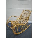 A MID CENTURY ROHE NOORDWOLDE STYLE BAMBOO ROCKING CHAIR (condition:-slightly worn finish)