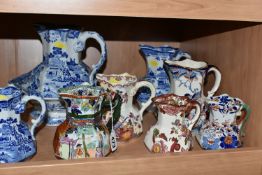 A GROUP OF MASON'S IRONSTONE JUGS, comprising a blue and white 'Willow' pattern pitcher (cracked), a