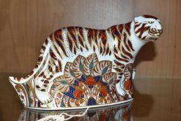 A ROYAL CROWN DERBY 'BENGAL TIGER' PAPERWEIGHT, with gold stopper, red backstamp and date cypher for