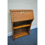 AN OAK STUDENT BUREAU, width 66cm x depth 23cm x height 93cm