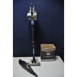 A VAX TBT3V182 BLADE CORDLESS VACUUM with attachments (NO charger) along with Bergstrom hand held